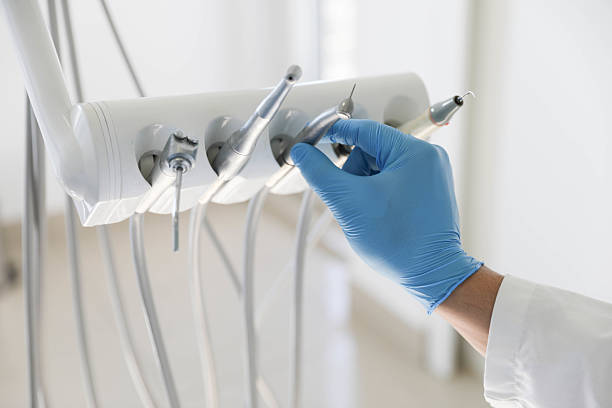 Professional Tooth Extraction technician working in Laurinburg, NC